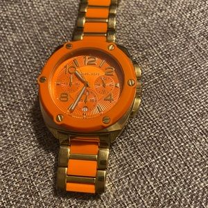 COPY - Michael Kors orange and gold watch.